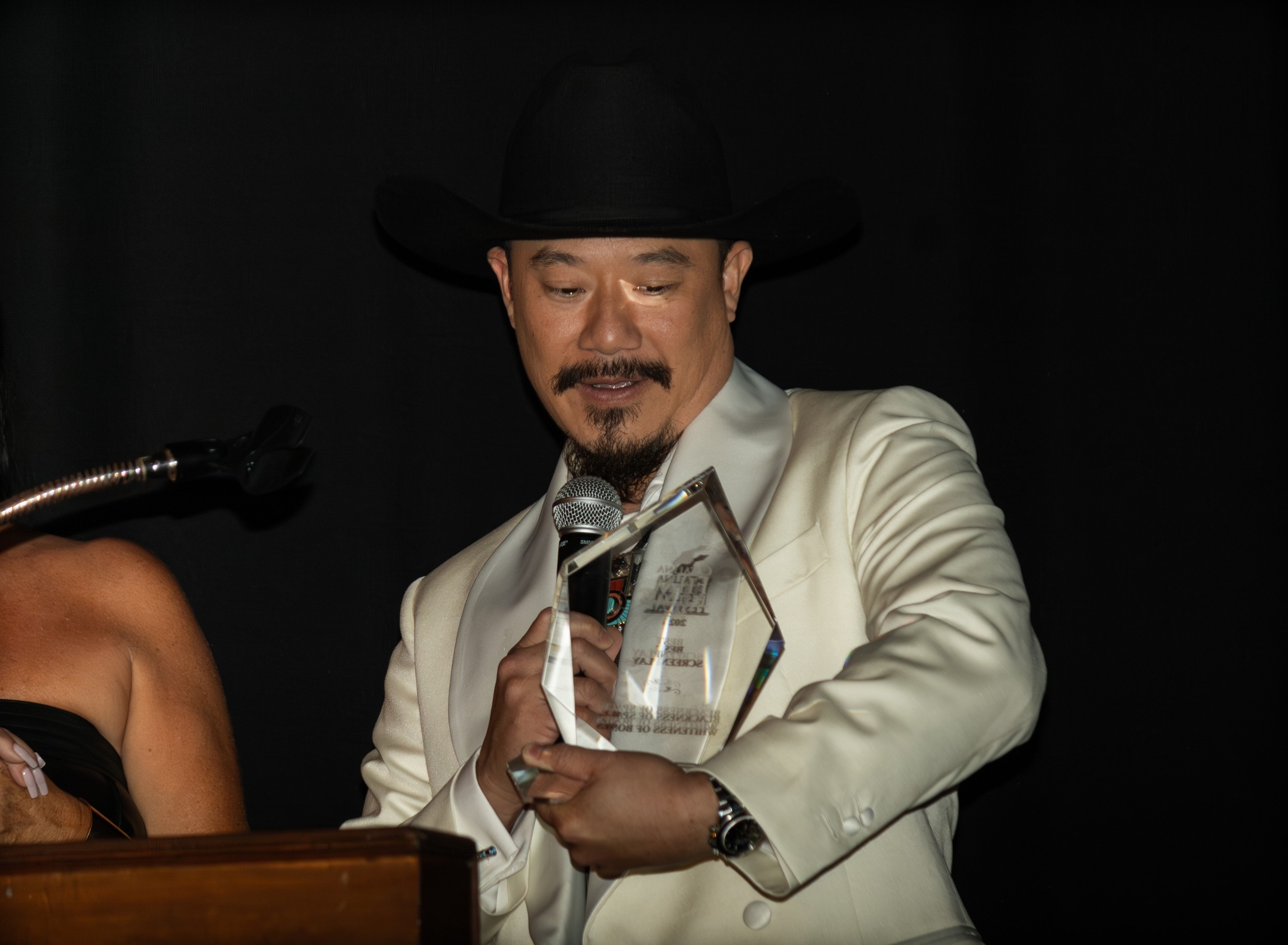 Award recipient smiling with Catalina Film Festival award